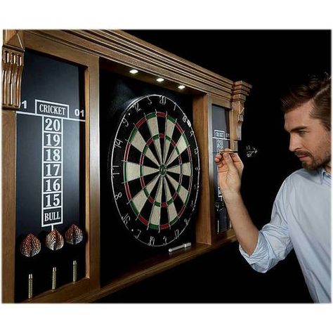 Unwind after a long day over a game of darts with this Medal Sports Barrington Woodhaven bristle dartboard cabinet set. The included mounting hardware allows for hassle-free setup, while the removable steel number ring enhances durability. Featuring a built-in scoreboard and dry-erase marker, this Medal Sports Barrington Woodhaven bristle dartboard cabinet set helps you keep up with every bull's-eye. Dart Cabinet, Dartboard Cabinet, Acoustic Ceiling Tiles, Dart Board Cabinet, Number Ring, Types Of Ceilings, Dart Set, Game Room Family, Box Joints