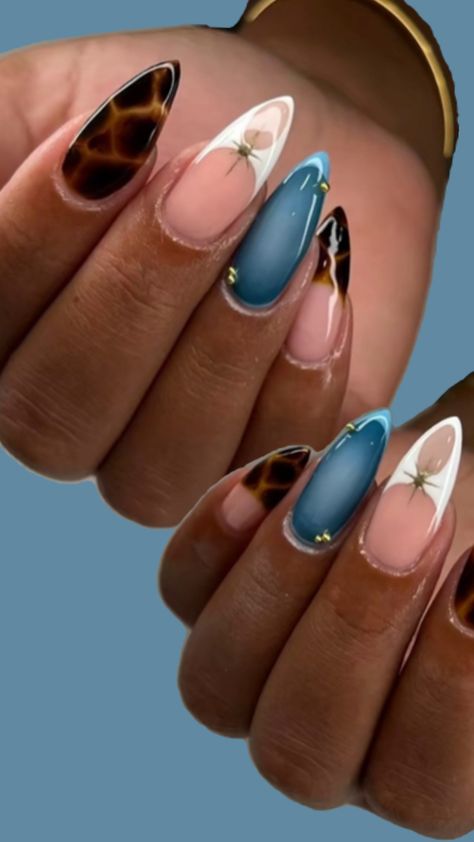 #trendingnails #naildesign #nailart #nails #almond #stiletto #inspo #nailinspo #gemstones #gems # turquoise #blue #babyblue #lightblue #brown #white #gold #leopard #leoprint #white Almond Stiletto, Turquoise Nails, Leopard Nails, Nails Almond, Blue Nails, Turquoise Blue, Nail Inspo, Ongles, Almond