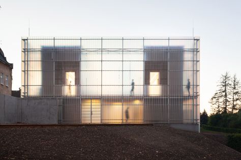 This constrained site led Stolín and Mičeková to develop the concept of breaking down the form of the building while keeping it unified by its outer skin.  "We want children to perceive and learn about architecture through various spatial configurations, which are implemented within the whole composition", they explained. Building Skin, Double Skin, Translucent Glass, Glass Facades, Chinese Architecture, Architecture Office, Zaha Hadid, Facade Architecture, Facade Design