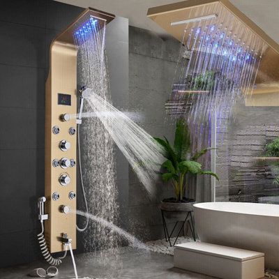 This LED Shower Panel Tower System Bathroom Shower Towe This Siamese type shower panel includes 7 functions: ①Rainfall② Waterfall③Massage jets④Tub spout⑤Hand shower⑥Temperature display⑦bidet sprayer, you can switch function according to your demand, Hydroelectricity Display LED Rainfall Waterfall Shower Head This product is an LED and digital display powered by water flow. There is a hydroelectric generator inside the product. When there is enough water flow, it will generate a safe power supply Overhead Shower Head, Shower Tower, Rain Shower System, Shower Wall Panels, Waterfall Shower, Bidet Sprayer, Shower Columns, Shower Panel, Fixed Shower Head