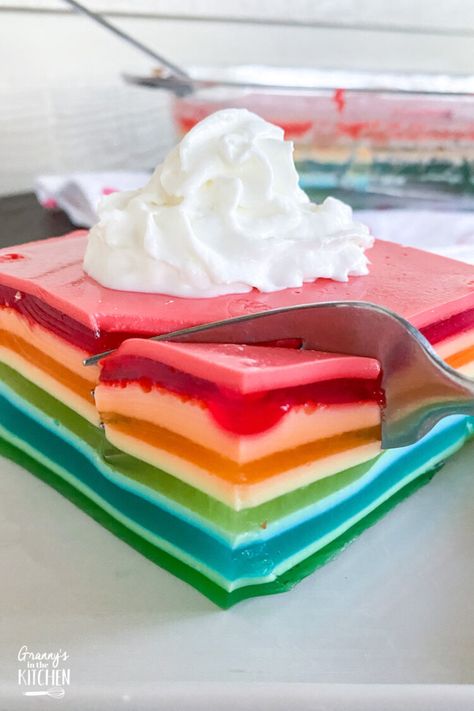 Layers of vibrant colors and flavors make this this vintage rainbow Jello ribbon salad recipe a total crowd pleaser! Ribbon Jello Recipe With Sour Cream, Ribbon Jello Recipe, Ribbon Jello, Rainbow Jello Recipe, Layered Jello Recipe, Jello Cake Recipes, Ribbon Salad, Rainbow Cake Recipe, Jello Mold Recipes