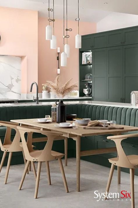 Green and pink kitchen with wooden accent L Shaped Banquette Seating In Kitchen, Kitchen Island Built In Seating, Island Booth Seating, Kitchen Island With Banquette Seating, Kitchen Island With Booth Seating, Island Banquette Seating, Kitchen Island Banquette, Kitchen Island Booth, Built In Breakfast Nook