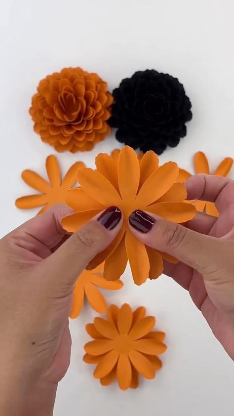 Halloween Paper Marigolds - quick and easy, great for a little banner across the mantle or a table. These marigolds only take 3 sheets of… | Instagram Cricut Fall Flowers, Marigold Flower Pattern, Marigold Flower Paper Craft, Marigold Flower Template, Marigold Paper Flower Template, Halloween Paper Flowers Diy, Marigold Paper Flower, Paper Marigolds Diy, Marigold Template