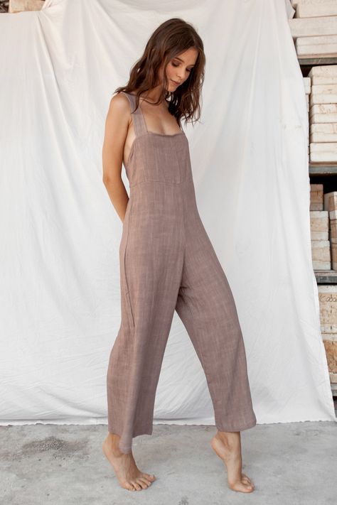 "Aisha 100% Natural Dye Jumpsuit - Lilac  Our Aisha 100% Natural Dye Jumpsuit is made from a Linen blend fabric. Its gorgeous lilac natural dye color is created from a mix of Indigo and Sappanwood. This midi-length jumpsuit features a criss-cross low back design, with thick straps and a clean straight neckline. With a little cheek and a lot of elegance, it can be dressed up or down for any day or evening occasion. This is the perfect outfit to make a statement, to promote the heritage of natural Cotton Linen Overalls, Linen Cotton Overalls, Linen Romper Dress, Linen Overalls Maternity, Brown Linen Overalls, Linen Clothes Jumpsuits & Rompers, Linen Overall, Jumpsuit Linen, Women Romper