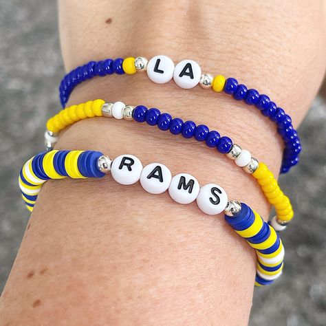 LA Rams Beaded Bracelet Set -  Stretch Bracelets | Vinyl Bead Bracelets | Stackable | Bracelet Stack Team Bracelets, Beaded Braclets, Preppy Bracelets, Stack Bracelets, La Rams, Fun Bracelet, Acrylic Letters, Diy Bracelet Designs, Letter Bracelet