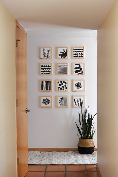 Learn how to create a gorgeous Artistic Hallway Gallery Wall using simple wooden blocks and paint. Add simple black paint and modern patterns to bring a creative, fresh and unique look to your home! Delineate Your Dwelling Bright Hallways, Hallway Artwork Ideas, Hallway Artwork, Hallway Gallery Wall, Hallway Gallery, Hallway Paint, Wooden Artwork, Hallway Decor, Decor Minimalist