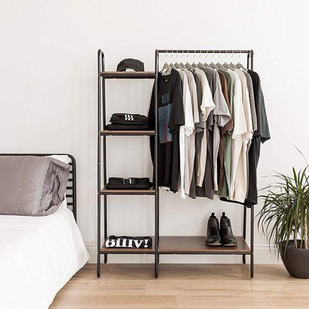 "Technical Specifications: Material: Wood + Metal Color: Rustic Brown The Weight Of The Clothes Rail: 22lbs Bearing Capacity Of The Large Shelf: 22lbs Load Capacity Of 4 Shelves: 11lbs Product Dimensions(LxWxH):40\" x 16\" x 60\" Height Between Shelves: 13\" Features and Benefits: The inclined frame prevents clothing from hitting the wall and provides a strong base so th rack will not fall. Smart storage racks: Large-capacity metal racks provide classified storage space to keep your clothes and Clothing Rack Bedroom, Mens Bedroom Decor, Closet Rack, Metal Clothes Rack, Open Wardrobe, Open Closet, Mens Bedroom, Garment Rack, Room Deco