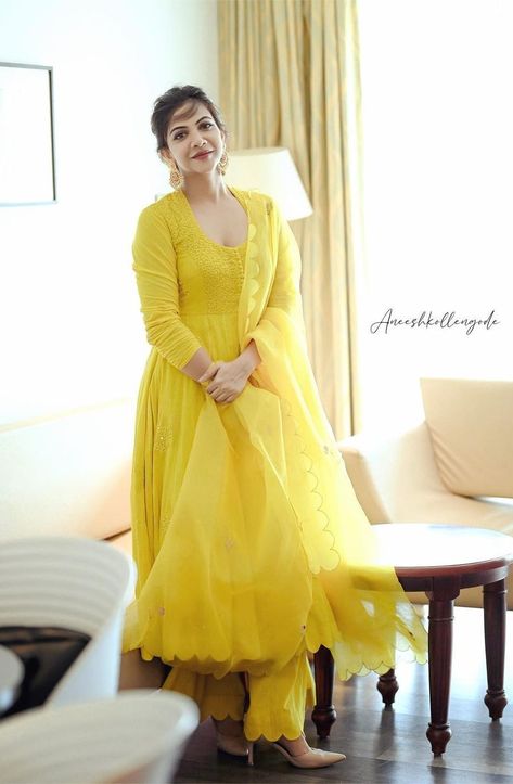 madonna sebastian in yellow kurta set by label earthen 1 Madonna Sebastian, Fashion Costume Halloween, Mehndi Outfits, Yellow Kurta, Mehndi Dress, Anarkali Dress Pattern, Latest Designer Sarees, Beautiful Suit, Long Frocks