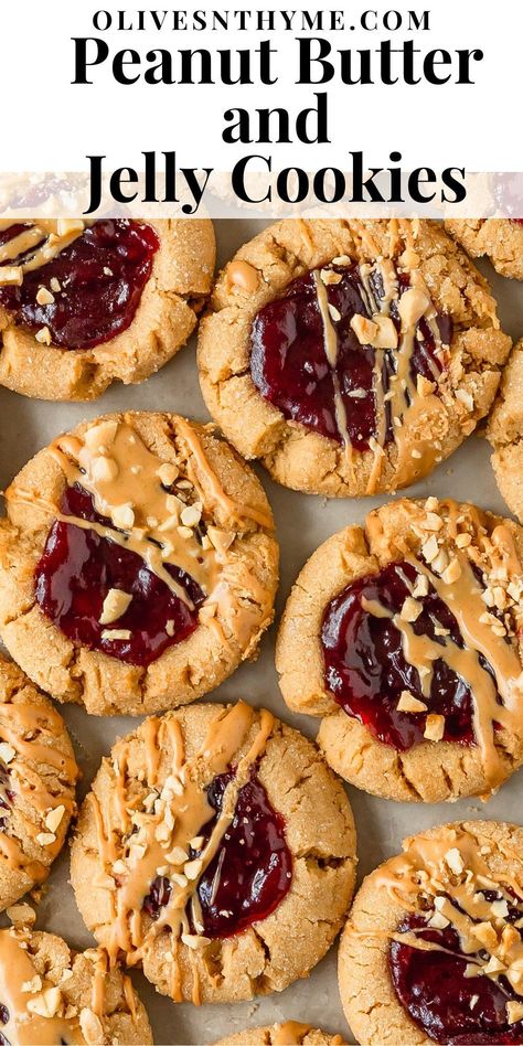 Peanut butter and jelly cookies are soft and chewy peanut butter cookies, rolled in a crunchy sugar coating, with a strawberry jam filled center. Top these easy to make peanut butter jelly cookies with a dollop of more jelly, a drizzle of PB and chopped peanuts after baking. These pb and j cookies are just like the classic sandwich in cookie form. Peanut Butter Cookies With Chocolate Drizzle, Fruit Crumble Cookies, Peanut Butter And Jelly Brownies, Peanut Butter Frosting Cookies, Strawberry Gooey Butter Cookies, Peanut Butter Cookies Thick, Easy Peanut Butter Cookies With Kisses, Best Crunchy Peanut Butter Cookies, Pb Jelly Cookies