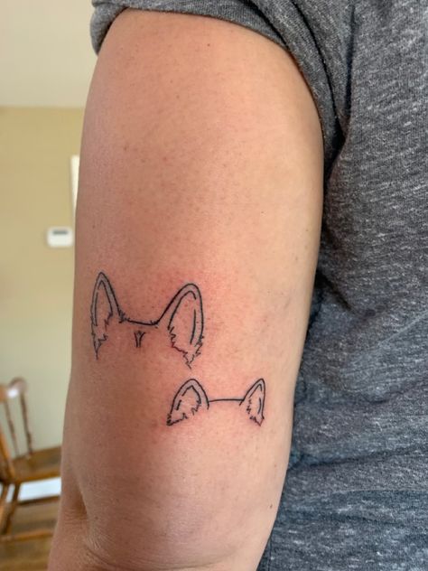 Fine line tattoo of our dogs ears. Done by Zac @MountainMule in Knoxville, TN Tattoos Inspired By Dogs, Line Tattoo Of Dog, Fine Line Corgi Tattoo, Floppy Ear Dog Tattoo, Fine Line Dog Tattoo Ears, Fine Line German Shepherd Tattoo, Fine Line Pet Portrait Tattoo, Animal Ear Tattoo, Dog Ear Outline Tattoo Placement