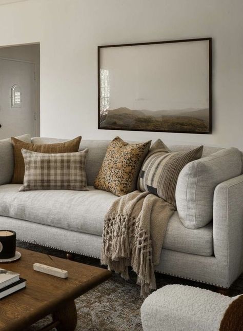 Winter Cosy Home, How To Decorate With Grey Walls, Heather Grey Couch Living Room, Modern Colonial Living Room Ideas, White And Dark Brown Living Room, Cozy Grey Couch Living Room, Greige Couch Living Room, Grey Couch Brown Pillows, Apartment Grey Couch