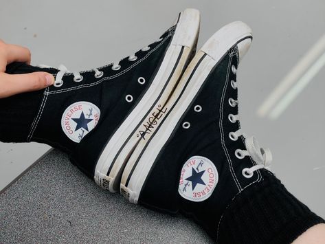 Someone in converse hightops putting their soles together. Writing on the converse reveal the word “Angel” in quotes. Please do not repost! Words On Converse, Writing On Converse, Converse Quotes, Shoe Writing, Converse Hightops, Grunge Shoes, Shoe Ideas, Converse High Tops, Please Do