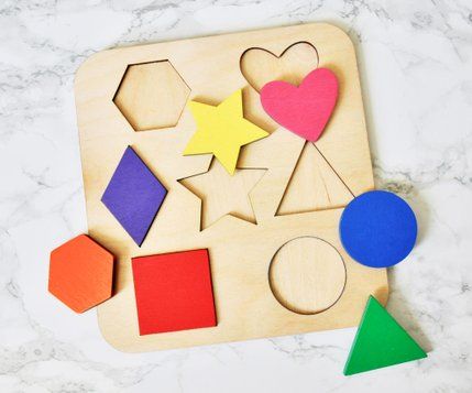 Wooden Shapes Puzzle: 7 Steps (with Pictures) Wooden Shape Puzzle, Glowforge Ideas, Kids Puzzles, Laser Cut Wood Crafts, Jigsaw Puzzles For Kids, Shapes For Kids, Lighting Sconces, Puzzles For Toddlers, Odessa Ukraine