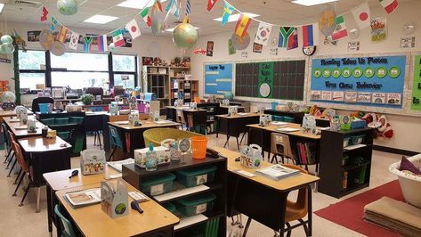 The desks are grouped in continents as part of the travel theme in my 4th grade classroom. Travel Classroom, Travel Theme Classroom, Art Classroom Decor, Classroom Culture, 5th Grade Classroom, Social Studies Classroom, Third Grade Classroom, History Classroom, Teaching Career