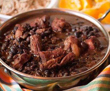 Brazilian Feijoada is a black bean and pork stew that is often served with farofa, toasted cassava flour.**Since we're using dried beans, you will need to soak them overnight before cooking the stew. ** Feijoada Recipe, Black Bean Stew, Brazilian Dishes, Chef Club, Pork Stew, Bean Stew, Brazilian Food, Portuguese Recipes, Bean Recipes