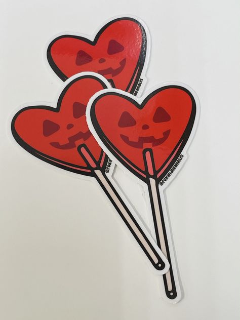 Show your love for Halloween and Valentines Day with this lollipop heart sticker. This candy hearts sticker is made from vinyl material for long lasting use. Measures roughly 3x3 Includes ONE sticker. Valentine Goth, Spooky Valentines, Goth Valentines, Heart Diy Crafts, Lollipop Heart, Spooky Love, Halloween Valentines, Valentine Doodle, Valentines Day Bears