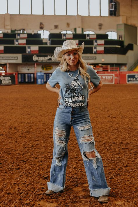 Flare jeans and boyfriend style denim are all the rage! These Distressed Wide Leg Denim jeans are sure to have you rocking the season. Pair with your favorite graphic tee and jewelry for a southern inspired look! Models are wearing a size 1 and 3. These run small, we suggest sizing up. Similar to Levi denim. No stretch Made in the USA The World Needs More Cowboys, Nfr Outfits, Trajes Country, Cowboy Graphic, Casual Country Outfits, Cowgirl Outfit, Fest Outfits, Country Style Outfits, Western Wear Outfits