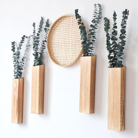 PRICES MAY VARY. Handmade Wood Wall Planter Decor: This is a 4-sided wooden vase that can't be filled with water, but is perfect for displaying artificial greenery, flower arrangements, seasonal decorations, shrub bunches, leaves, fake lavender, eucalyptus stems, or cotton that will brighten up a room and create a nature vibe! Sturdy Pine Vases: These hanging vases are made of sturdy natural pine wood, making each vase slightly different. Their tough and dense structure makes them resistant to d Wall Decor Shelves, Wood Wall Planter, Indoor Plants Small, Fake Lavender, Wall Mounted Plant, Wall Plants Indoor, Wall Vase Decor, Planter Decor, Wall Vases