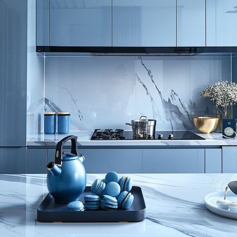 Modern blue kitchen with sleek cabinetry, marble backdrop, and stainless steel appliances - ideal for modern interior design enthusiasts. Modern Blue Kitchen, Marble Backdrop, Blue Kitchen Designs, Blue Color Palette, Functional Space, Blue Kitchen, Steel Appliances, Modern Blue, Blue Colour Palette