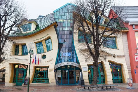 The Crooked House, Sopot, Poland 'The little crooked house' looks like something from a fairytale, but it is in fact a shopping centre on a street in Sopot's Monte Cassino. Mixed Use Commercial Building, The Crooked House, Deconstructivist Architecture, Disney Parks Aesthetic, Beijing National Stadium, Frank O Gehry, Sopot Poland, Bernard Tschumi, Peter Eisenman