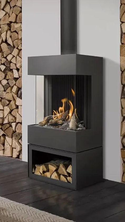 black fireplace unique fireplace gas stove fireplace in a modern home luxury fireplace Modern Fireplace Ideas Living Rooms, Modern Wood Burning Stoves, Small Wood Stove, Standing Fireplace, Lpg Gas, Freestanding Fireplace, Rocket Stoves, Floating Shelves Diy, Home Fireplace