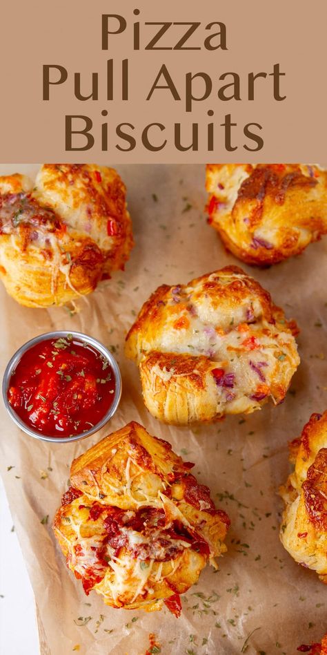 Easy to make and so impressive, these Pizza Biscuits are perfect for game day noshing, after school snacks, or even to pop in a lunch box. They start with convenient canned biscuit dough, and are baked with your favorite pizza toppings in fun individual muffin tins! Easy Biscuit Pizza Recipe, Easy Recipes Using Canned Biscuits, Pizza Party Toppings, Pizza Rolls With Biscuits, Canned Biscuit Pizza Recipes, Pepperoni Rolls With Biscuits, Dinner With Canned Biscuits, Biscuits Meals Ideas, Appetizers With Biscuits