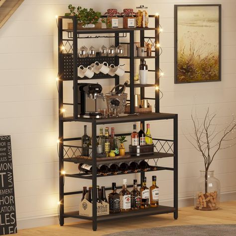 PRICES MAY VARY. 【Versatile Storage Wine Rack】This wine rack table features a hutch, 2 lower shelves, and a horizontal wine rack under the shelf capable of holding up to 6 bottles, saving storage space while creating a tidy area for your home bar. It also comes with 2 stemware racks, and a pegboard with 3 flexible hooks for holding bar accessories or mugs. The spacious countertop effortlessly accommodate your coffee maker and wine accessories, making it a perfect place for a home drink after wor Industrial Coffee Bar, Liquor Bar Cabinet, Coffee Bar Table, Wine Rack Table, Cabinet With Storage, Liquor Bar, Glass Holder, Wine Holder, Glass Holders