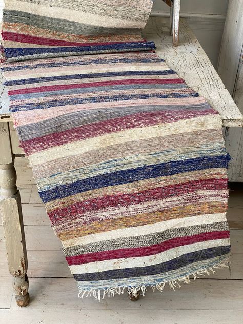 Hello and welcome to the Textile Trunk! Please follow us on Instagram, we are @textiletrunk This lovely textile is a hand loomed rag rug from Europe, dating from the early to mid 1900's. ~ Gorgeous farmhouse striped pattern and colors! This textile was woven by hand and used as a floor covering. This bolt was woven with a cotton thread warp and the weft is woven with strips of various cloths! This piece has a lovely fringe on its edges! In this textile (if you look closely) there is just about e 5 Hobbies, Loom Rug, Gorgeous Farmhouse, Peg Loom, Hallway Carpet, Runner Carpet, Weave Rug, Stair Runner, Floor Covering