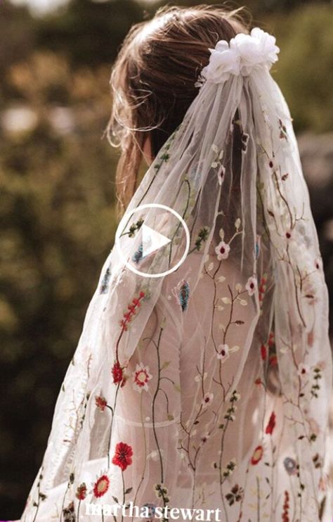 ✓Bohemian brides, this colorful, embroidered veil by Elodie Courtat is for you. Filled with climbing cherry blossom vines and daisies, the veil has one additional floral touch: A textured petal topper, placed where the veil is pushed into the hair. #weddingideas #wedding #marthstewartwedding #weddingplanning #weddingchecklist wed,