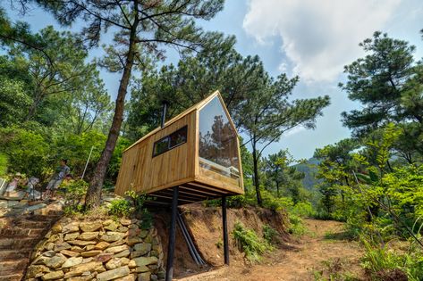 Photo 2 of 15 in This Minimalist Cabin in Vietnam Is the Perfect Forest Escape - Dwell Scandinavian Village, Design Casa Piccola, Minimalist Cabin, Houses Architecture, Building A Treehouse, Wooded Landscaping, House On Stilts, Casa Container, Modern Tiny House