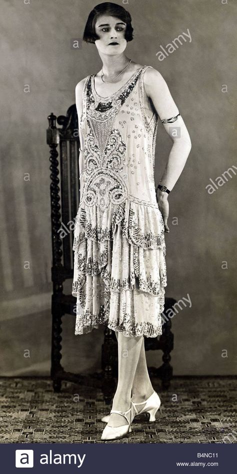 Fashion 1920s Evening Gown July 1926 Evening gown of paillette and Stock Photo: 20139421 - Alamy 1920s Evening Gowns, Twenties Fashion, Fashion 1920s, Flapper Dresses, William Powell, 1920 Fashion, Myrna Loy, 1920's Fashion, Flapper Girl