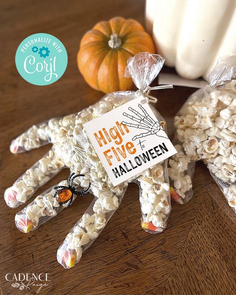 "If you're looking for a fun and simple Halloween treat for neighbors, friends, or classmates, hand out a unique Halloween High Five! These DIY tags were made especially for Halloween popcorn hands, but can be used for any spooky gift. You'll receive access to an editable file so that you can print 6 tags to a page and trim as many as you like. Because little goblins need high fives too!   ♥ DEMO LINK♥  Try before buying! Simply copy and paste the URL below into your browser: https://www.corjl.c Halloween Hand Treat Bags, Halloween Treat For Classmates, Halloween Treat For Classroom, Halloween Ideas For Students, Halloween Popcorn Hands, Halloween Gift Bags For Teachers, Diy Halloween Gifts For Friends, Halloween Cheer Gifts, Halloween Candy Handout Ideas