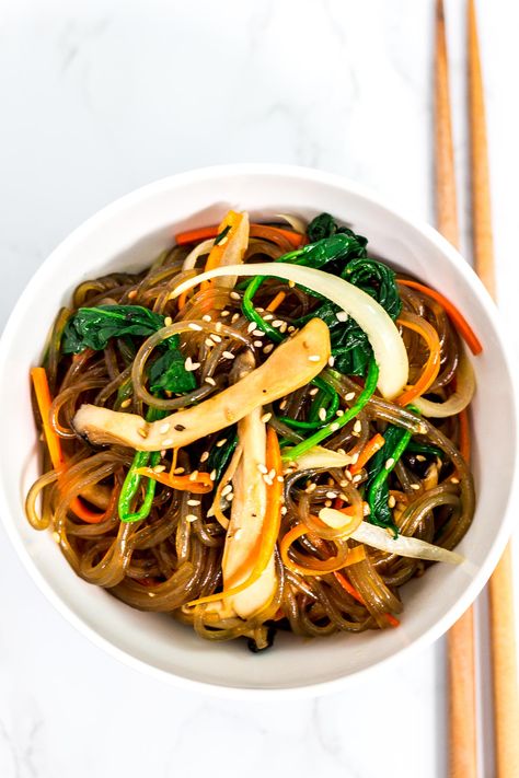 Vegan Japchae (Korean glass noodles) recipe - This is my mom's authentic Japchae recipe made into a vegan-friendly version! Sweet and savory noodles with different vegetables to create a perfect dish that everyone will love! Savory Noodles, Japchae Recipe Korean, Japchae Recipe, Stir Fry Glass Noodles, Glass Noodles Recipe, Korean Glass Noodles, Yummy Vegetables, Asian Vegetarian Recipes, Vegan Asian Recipes