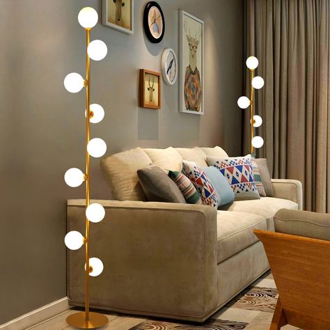 Offering a boost of brightness and a splash of contemporary style, this floor lamp is perfect for breathing new life into any layout. This tree floor lamp is founded atop a metal base that lets you easily tuck it into narrow nooks and unused corners. A solid finish outfits the slender metal body for a minimalist touch. Up above, spherical shades are designed for a mid-century-inspired look.   - Material: Metal, Glass - Finish: Gold - Overall Height: 60.6" (1540mm) - Diameter of Light Fixture: 9. Chambre Inspo, Tree Floor Lamp, Floor Lamps Living Room, White Floor Lamp, Room Lamp, Standing Lamp, Modern Floor Lamps, Lamps Living Room, My New Room