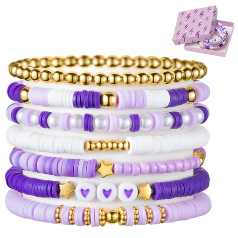 PRICES MAY VARY. Purple Stackable Bracelets: Elevate your accessory with our purple heishi bead bracelet set, featuring seven unique pieces that add flair to any ensemble. Five bracelets boast a captivating blend of gold-plated beads, purple and white clay beads, while one alternates between pearl beads and purple clay beads. The final piece features a string of gold-plated round beads, completing this stunning collection. Crafted with Care: Our purple friendship bracelets are carefully strung f Stitch Beaded Bracelet, Purple Bracelet Clay Beads, Friends Themed Bracelets, Clay Bead Brackets Ideas, Braclets Ideas Clay Beads Easy, Cute Clay Bead Ideas, Clay Bracelets Ideas Aesthetic, Flat Bead Bracelet Ideas, Bead Brackets