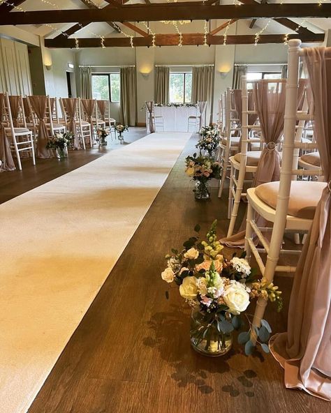 White carpet aisle runner with white chiavari chairs dressed with chair drapes and flowers Wedding Pathway, Chair Drapes, White Chiavari Chairs, Aisle Runner Wedding, White Runners, Red Carpet Runner, Double Wedding, Indoor Ceremony, White Carpet