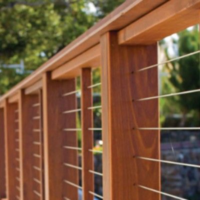 Installing stainless steel cable railing for your deck railing infill adds protection while increasing your backyard views Deck Posts Ideas, Modern Wood Railing, View Rail, Horizontal Deck Railing, Deck Railing Diy, Wire Deck Railing, Contemporary Balcony, Deck Railing Kits, Deck Rails