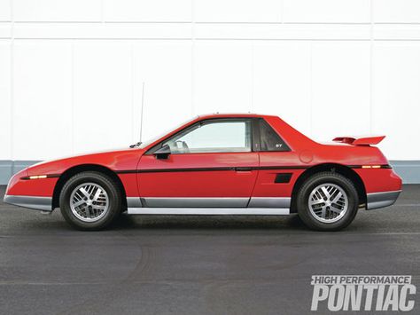 The ’85 Fiero GT borrowed its exterior package from the limited-edition Indy Pace Car Replicas of the previous year. The only thing they did not get was the real Pace Car’s wild hoodscoop, which extended over the top of the roof. Cool Vehicles, Fiero Gt, Pontiac Fiero Gt, Pontiac Fiero, Pontiac Cars, Pontiac Grand Am, Sweet Cars, Us Cars, Classic Cars Muscle