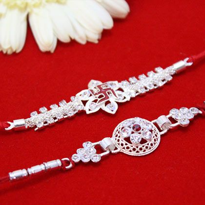 Stone Studded Silver Rakhis at http://rakhi.primogiftsindia.com/silver-rakhi-735.htmlsilver Silver Rakhi, Gold Jhumka, Gold Jhumka Earrings, Rakhi Design, Arab Beauty, Raksha Bandhan, Jhumka Earrings, Stone Studs, Gold Jewellery Design