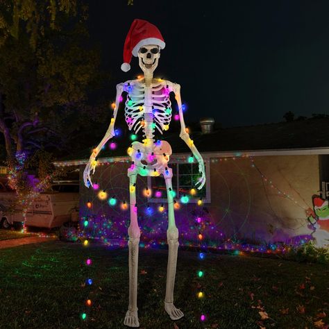 PRICES MAY VARY. Skeleton Santa Costume Accessory: enjoy the holiday atmosphere with these 12 ft skeleton Santa costume accessories, including a Santa hat and a string of C9 colored lights; They make your Skeleton decorations more festive in Halloween and Christmas Ideal Size and Quality Material: this Christmas hat is about 23 inches in width and 34 inches in height, crafted with polyester imitation wool, assures lasting durability and comfort; The colorful Christmas lights are UL certification Christmas Skeleton Ideas, 12 Ft Skeleton Christmas Ideas, 12ft Skeleton Christmas, Skeleton Christmas Decorations, 12 Ft Skeleton Christmas, Christmas Skeleton Decorations, 12 Foot Skeleton Christmas, Creepy Christmas Decorations, 12 Ft Skeleton Ideas