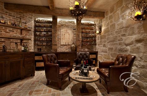 Mediterranean wine cellar with comfortable seating.  #winecellars homechanneltv.com Unique Wine Cellar, Wine Room Design, Bourbon Room, Wine Cellar Basement, Whiskey Room, Tuscan Farmhouse, Home Wine Cellars, Wine Tasting Room, Wine Cellar Design