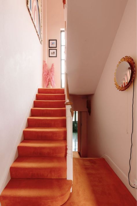 Glass Wall Stairs, Pink Hallway, Wall Stairs, Leather Banquette, Green Hallway, London Houses, Orange Carpet, Wooden Floorboards, Open Plan Kitchen Dining