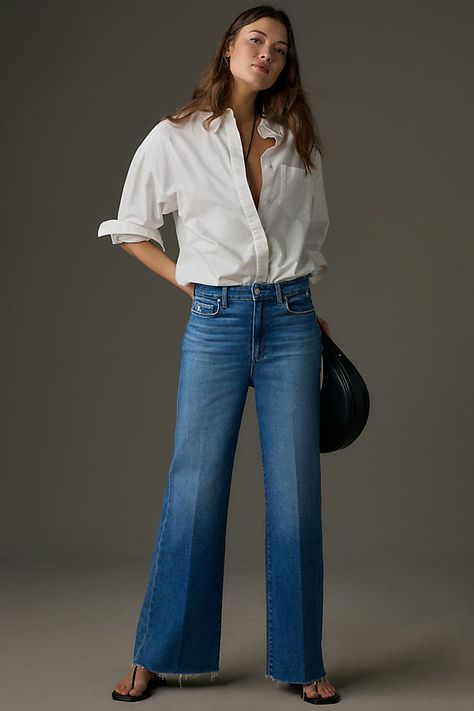 93% cotton, 5% polyester, 2% elastane Five-pocket styling Front zip Machine wash Imported | Anessa High-Rise Wide-Leg Jeans by PAIGE in Blue, Women's, Size: 25, Polyester/Cotton/Elastane at Anthropologie Spring Outfits Wide Leg Jeans, Paige Anessa Jeans, Wide Leg Denim Pants Outfit, Fun Outfits For Women, High Rise Wide Leg Jeans Outfit, Wide Leg Jeans Fall, Wide Leg Jeans And Boots, Wide Leg Denim Outfit, Outfits With Wide Leg Jeans