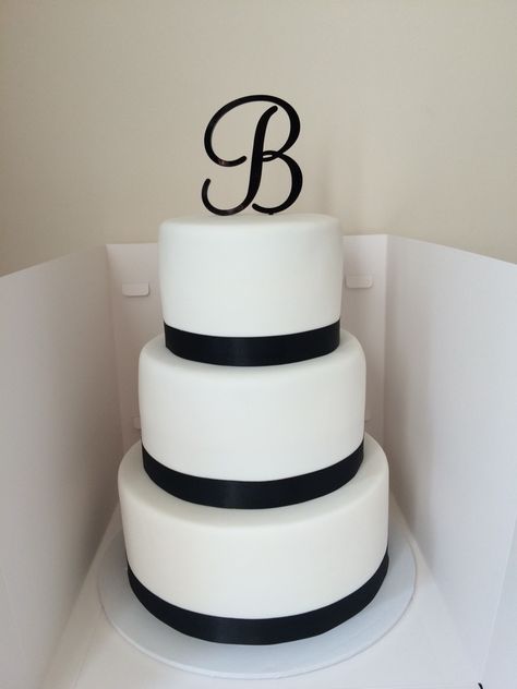 Black and white wedding cake Wedding Cake With Black Ribbon, Black And White Wedding Cake, White Wedding Cake, Black And White Wedding, Black Ribbon, White Wedding, Wedding Cake, Wedding Cakes, Ribbon