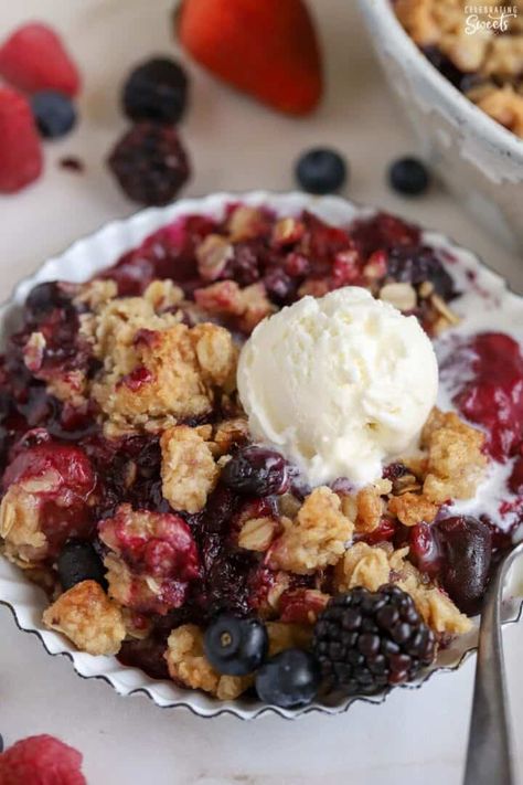 This Berry Crisp is made with fresh or frozen berries and topped with a brown sugar crumble. A quick and easy dessert that comes together in minutes. Triple Berry Crisp, Easy Blueberry Crisp, Using Frozen Fruit, Mixed Berry Crisp, Grape Dessert, Blueberry Crisp Recipe, Fruit Crisp Recipe, Holiday Ice Cream, Strawberry Crisp