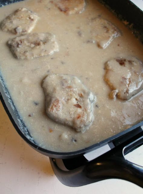 Pork chops and mushroom soup gravy are comfort food at its best. This easy electric skillet meal is a great way to feed your family and fill them up! Pork Chops And Mushroom Soup, Pork Chops In Mushroom Soup, Mushroom Soup Gravy Recipe, Mushroom Soup Gravy, Pork Stuffing, Mushroom Soup Pork Chops, Stuffing Easy, Skillet Pork Chop Recipes, Food Slow Cooker