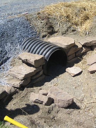 driveway culvert stone wall Diy Culvert Ideas, Culvert Landscaping Ideas Drainage Ditch, Culvert Landscaping Ideas, Culverts Ideas, Ditch Landscaping, Driveway Culvert, Drainage Ideas, French Drains, Driveway Entrance Landscaping