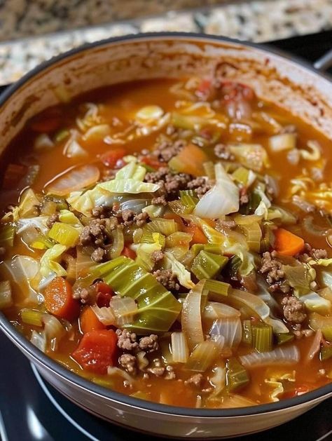 Warm up with this comforting and simple Easy Cabbage Soup, perfect for cozying up on a rainy day. This hearty soup combines tender cabbage, flavorful stewed tomatoes, and savory ground beef, all seasoned with a convenient Lipton Onion Soup Mix. With just a few basic ingredients and minimal prep, you’ll have a delicious and satisfying […] Deconstructed Cabbage Rolls, Easy Cabbage Soup, Recipes Cabbage, Quick Soup Recipes, Quick Soup, Cabbage Roll Soup, Soup Ingredients, Grandma Cooking, Lipton Onion Soup Mix