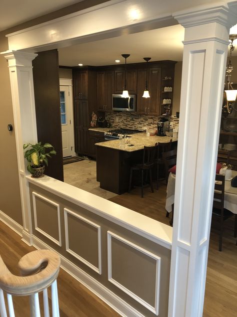 load bearing wall, half wall with decorative columns and picture frame molding Build A Half Wall, Half Wall With Columns, Wall Between Kitchen And Living Room, Half Wall Kitchen, Half Wall Room Divider, Kitchen Columns, Half Wall Ideas, Knee Wall, Pony Wall