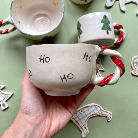 Handmade ceramic mug 🤍 350ml handmade ceramic mug with handle. *Products may differ from each other as they are handmade. Handmade Crafts For Christmas, Christmas Ceramics Pottery Mugs, Christmas Mug Ceramic, Christmas Mug Diy, Hand Made Mug, Christmas Ceramic Mug, Christmas Mugs Diy, Christmas Ceramics Ideas, Ceramica Ideas Originales